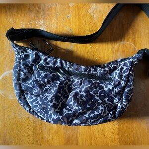 Fabletics leopard print sling bag purse with zippers and adjustable strap